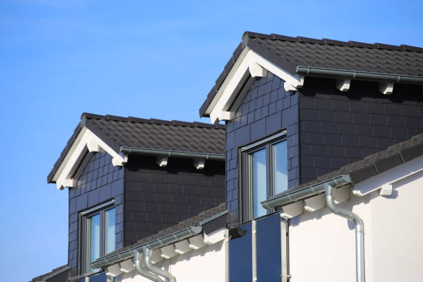 istock Slate cladded dormer on a new tiled roof 1300792365