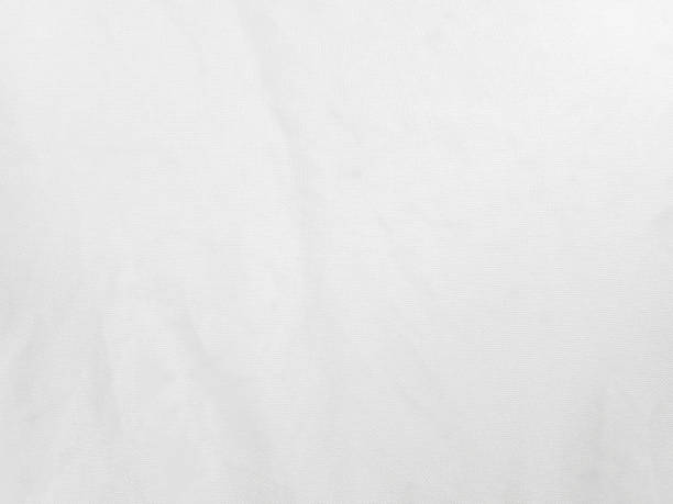 istock Soft white wrinkled fabric background for graphic design 1300792476