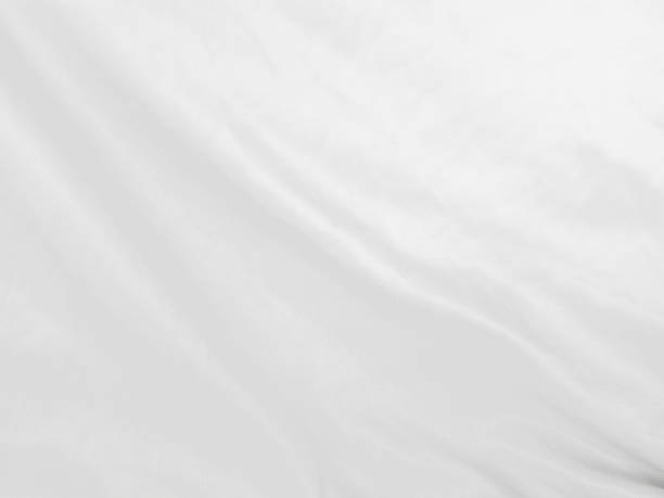istock Soft white wrinkled fabric background for graphic design 1300792553