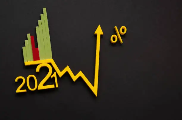 Photo of Economic recovery after the crisis. Economic growth concept, histogram of the economy with an upward arrow.