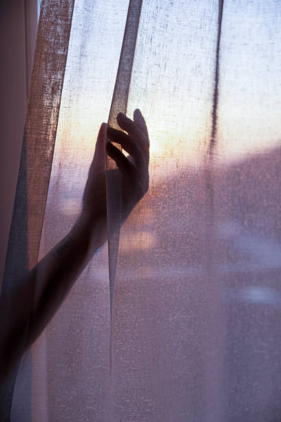 istock woman hand silhouette 1300794791