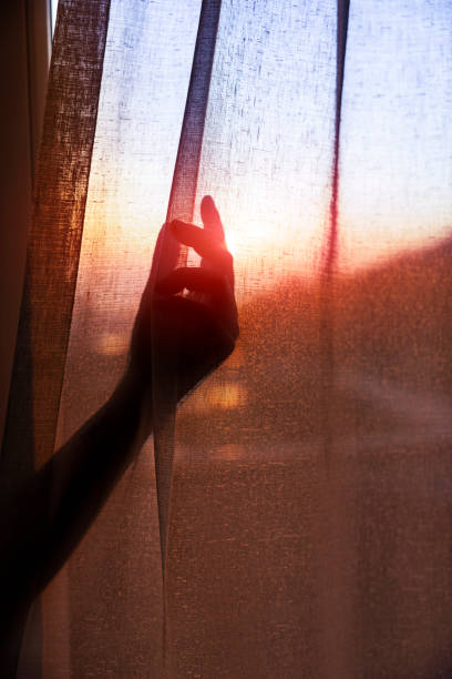 istock woman hand silhouette 1300794795