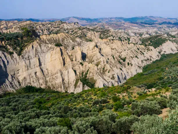 Scenic view of Aliano badlands (calanchi), lunar landscape made of clay sculptures eroded by the rainwater, Basilicata region, southern Italy