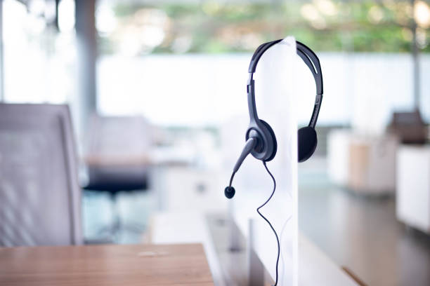 istock Communication support, call center and customer service help desk. VOIP headset for customer service support (call center) concept 1300797317