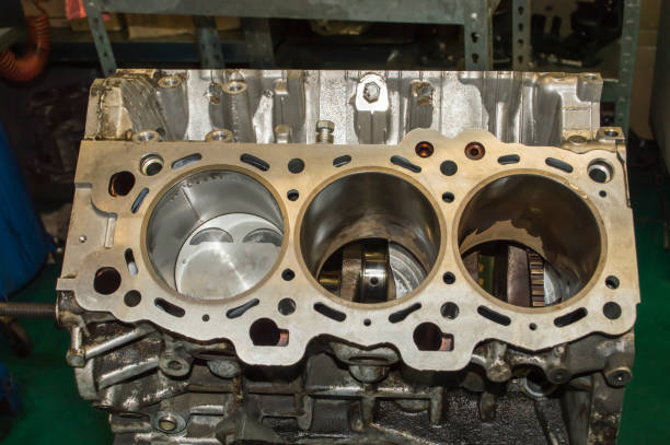 istock Top view of a row of cylinders with one new piston 1300802893