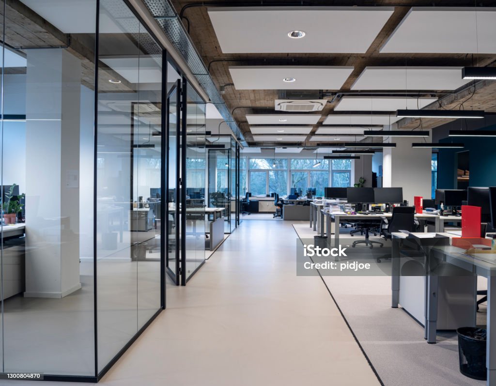 Interior Of An Empty Modern Loft Office open space Impression of an interior of a modern office Office Stock Photo