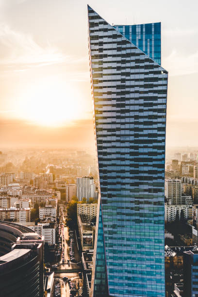 Warsaw city with modern skyscraper at sunset, Poland