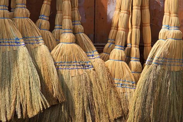 A background of traditional straw brooms in the Lebanese town of Batroun.