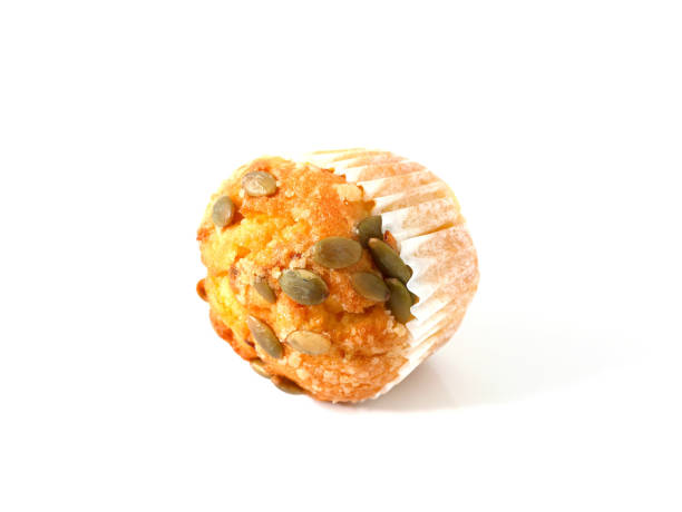istock Pumpkin muffin topped with pumpkin seeds 1300807176