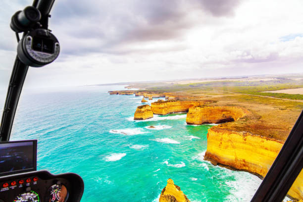 istock Helicopter flight over the Pacific ocean 1300808691