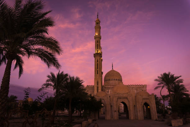 istock Beautiful large Islamic mosque at the sunset sky background 1300811226