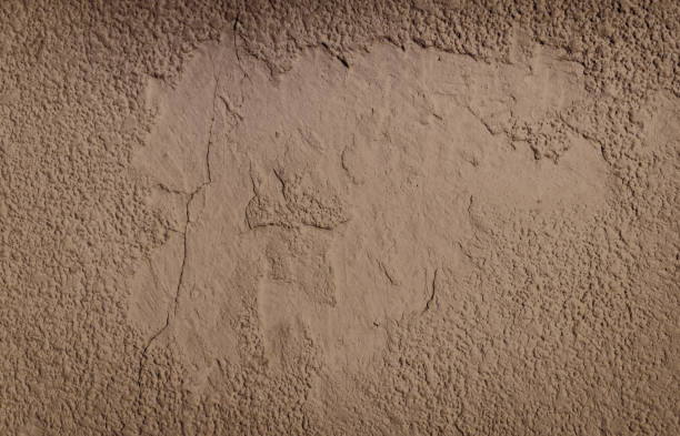 istock Old retro background of natural pattern stone wall 1300812248