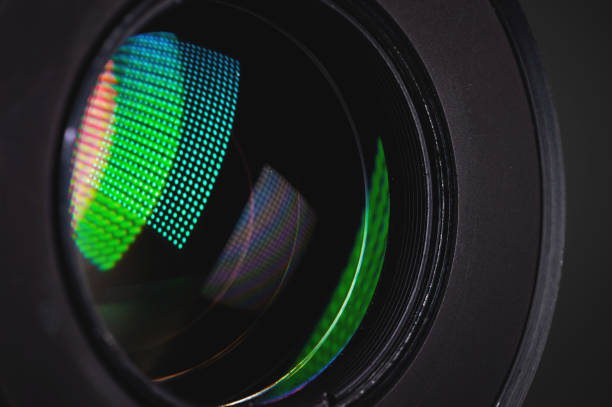istock Close-up of a camera mirror lens front lens with aperture and highlights from a light source 1300814008