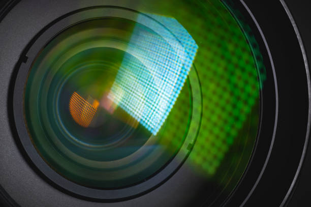 istock Close-up of a camera mirror lens front lens with aperture and highlights from a light source 1300814017