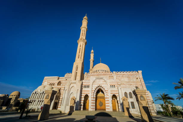 istock Beautiful large Islamic mosque at the sky background 1300814172