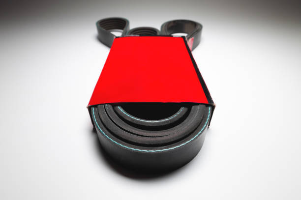 Wide poly-V bypass belt for internal combustion engine attachments in red carton. New spare alternator belt.