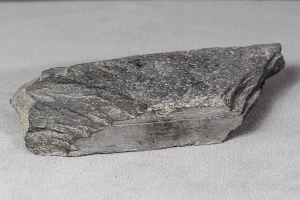 istock a gray flat brick shaped rock found many years ago 1300820750