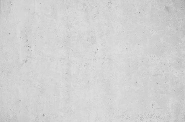 istock surface of grey concrete wall abstract background in the room structure for wallpaper. 1300820873