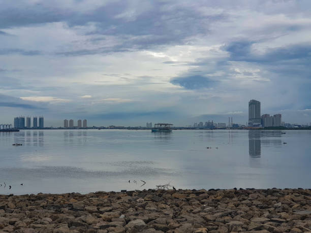 istock Jakarta bay with tall buildings 1300822192