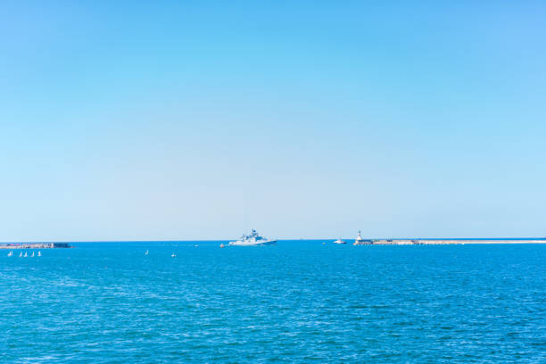 Coastline and waves in the sea, sunny Crimean summer. Horizontal orientation stock photo
