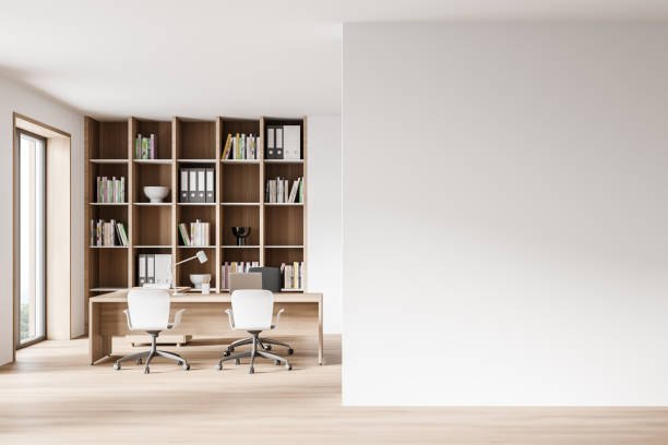 istock White and wooden CEO office interior with mock up wall 1300822887