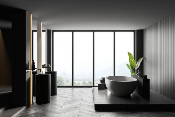 istock Panoramic gray bathroom interior with tub and sink 1300822912