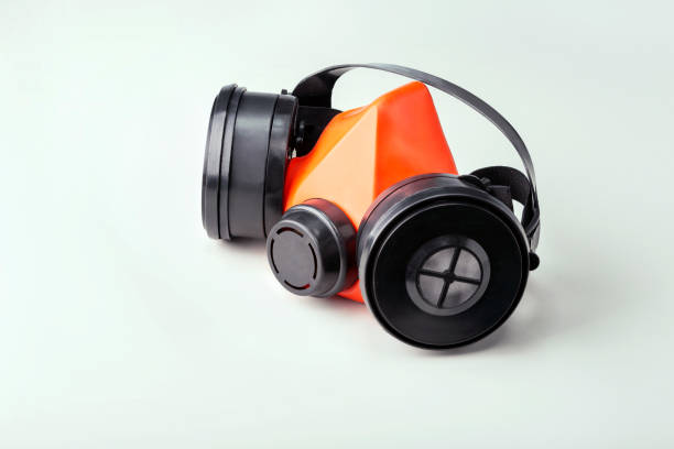 istock Respirator on gray surface. Personal protection equipment. 1300825308
