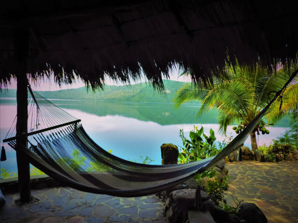 Hammock in Paradise Hammock in front of lake latin america nicaragua stock pictures, royalty-free photos & images