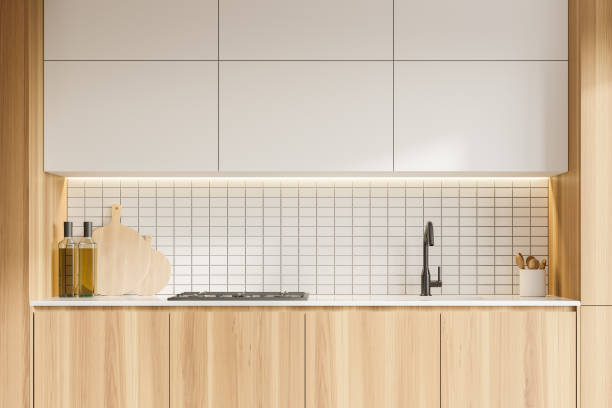 istock White kitchen with white and wooden cupboards 1300825462