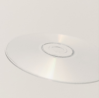 Isolated CD with refracted rainbow pattern. Some scratches and dust - just like every CD in your collection.