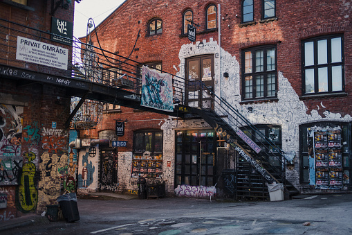 February 7, 2021. Oslo, Norway: Street scene in Ingens Gate area at Grunerlokka in Oslo. No house has the address Ingens gate, which is not listed in the Oslo municipality's district map. The area is characterized by street art and other anti-authoritarian activities.
