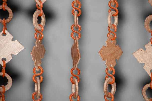 istock Elements of hanging curtains on the door. Chains from top to bottom, rows. View from the front. 1300829529