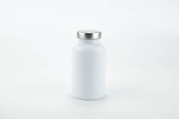 istock Pills bottle isolated on white background. 1300832116