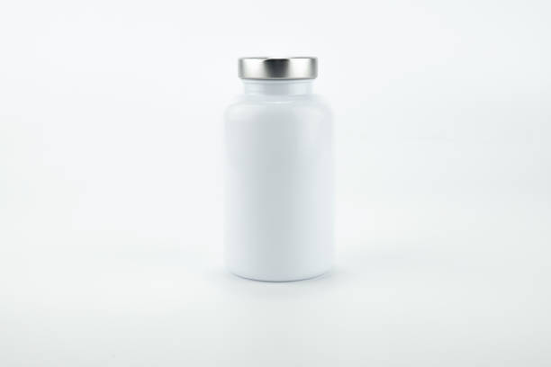 istock Pills bottle isolated on white background. 1300832196