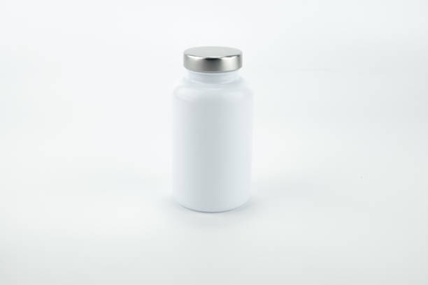 istock Pills bottle isolated on white background. 1300832245