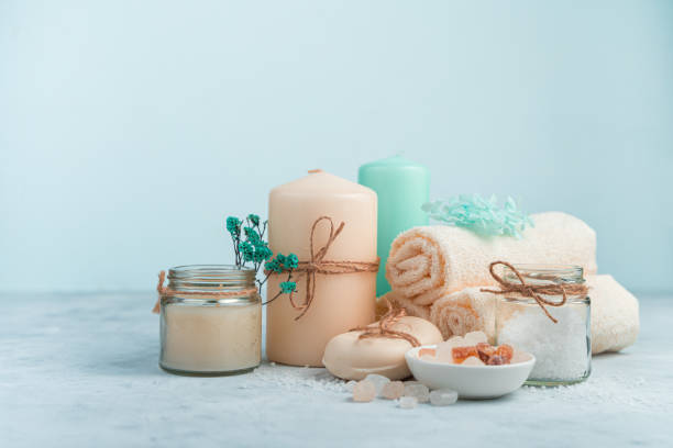 istock Set for skin care on a blue background. Side view, horizontal. Spa composition 1300834288