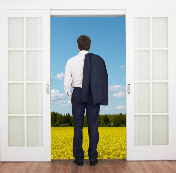 istock Man at the office door 1300834362
