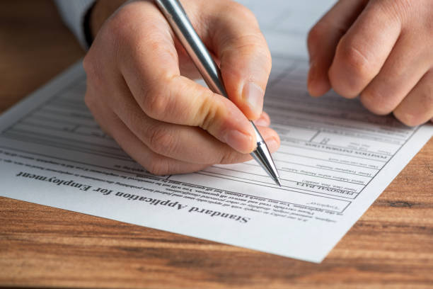 istock Filling out a standard application for employment 1300834381