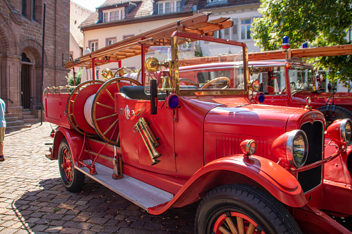 Neckargemuend, Germany: July 16, 2018: Exhibition of old, historical fire engines on the market place of Neckargemünd, a small town in southern Germany.