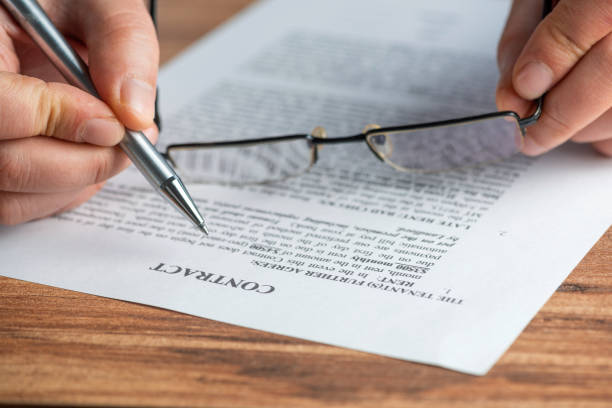 istock The man is reading the contract. 1300836544