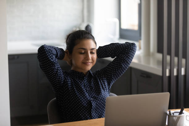 istock Calm Indian woman relax sleeping at home workplace 1300836683