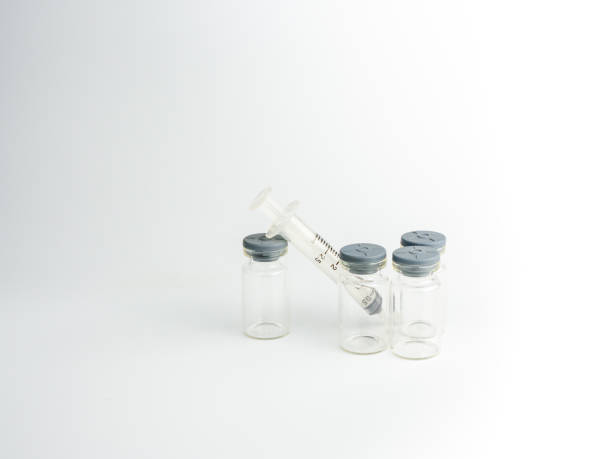 istock Syringe and vaccine bottle On a white background 1300836992