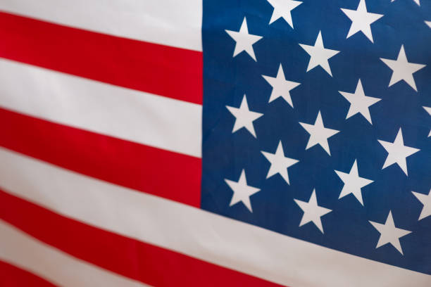 istock American flag as a background. Blurred background. 1300839448