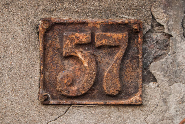 Old retro cast iron plate number 57
