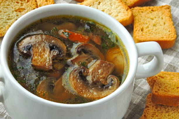 istock Fresh mushroom soup with crackers. 1300844448