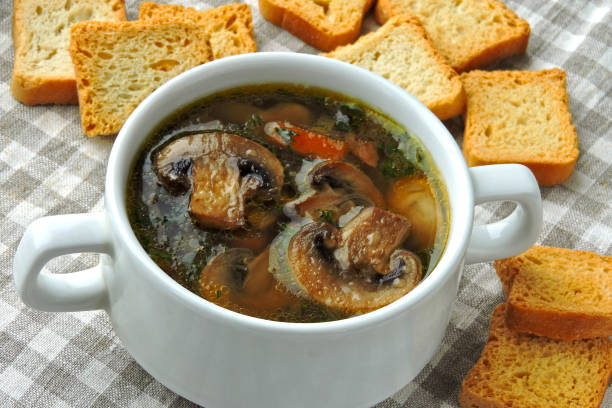 istock Fresh mushroom soup with crackers. 1300844472