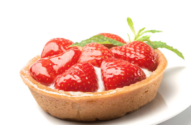 istock sweet basket with cream and strawberries, over white 1300845833