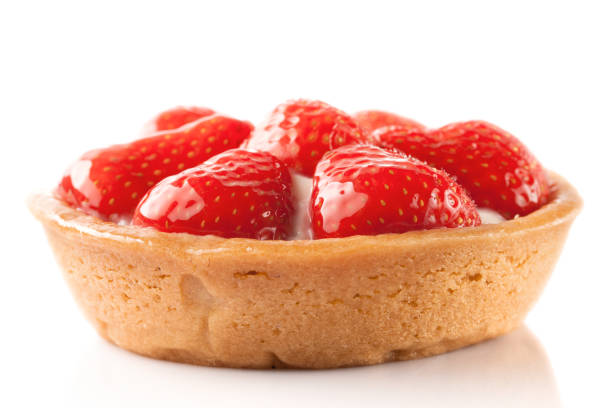 istock sweet basket with cream and strawberries, over white 1300845948