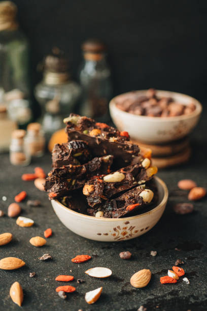 istock Dark chocolate with dried berries, fruit and nuts. 1300846022