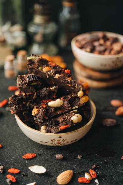 istock Dark chocolate with dried berries, fruit and nuts. 1300846103